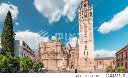 Seville Cathedral and Giralda Tower timelapse hyperlapse, Spain 128826345