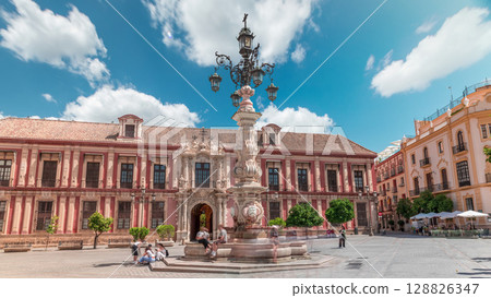 Archbishop Palace of Seville and Fuente Farola Fountain on Plaza de Virgen de los Reyes timelapse Archbishop Palace of Seville and Fuente Farola Fountain on Plaza de Virgen de los Reyes timelapse 128826347