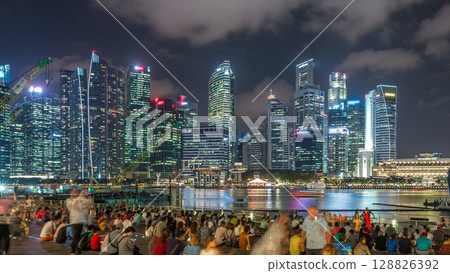 Light and Water Show along promenade in front of Marina Bay Sands timelapse hyperlapse. 128826392