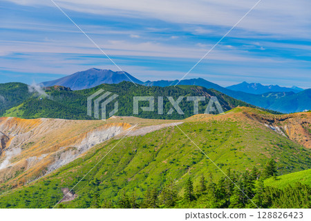 (Gunma Prefecture) View from Shibu Pass (the highest point on the national highway in Japan), with the crater of Mt. Shirane and Mt. Asama and the Alps in the background (Gunma Prefecture) View from Shibu Pass (the highest point on the national highway in Japan), with the crater of Mt. Shirane and Mt. Asama and the Alps in the background 128826423