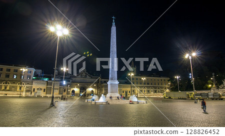 People are gathering under the central column on piazza del popolo during night timelapse hyperlapse 128826452