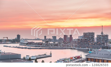 Panoramic aerial day to night timelapse of Katendrecht peninsula and Maashaven harbour in Rotterdam, The Netherlands. 128826503