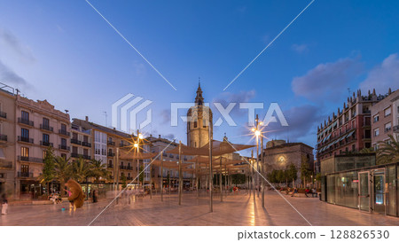 Panoramic day to night timelapse hyperlapse of Plaza de la Reina in Valencia, Spain. 128826530