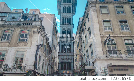 Historic elevator Santa Justa, lift in Lisbon, Portugal. Elevador de Santa Justa timelapse 128826578