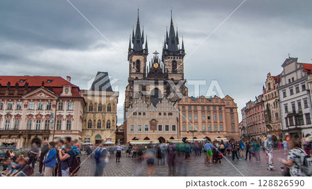 Old town square in Prague timelapse hyperlapse, Tyn Cathedral of the Virgin Mary and monument of Jan Hus. Old town square in Prague timelapse hyperlapse, Tyn Cathedral of the Virgin Mary and monument of Jan Hus. 128826590