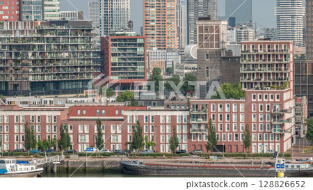 Aerial timelapse of modern buildings in Rotterdam city center, The Netherlands. 128826652