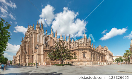 Seville Cathedral and Giralda Tower timelapse hyperlapse, Spain Seville Cathedral and Giralda Tower timelapse hyperlapse, Spain 128826665