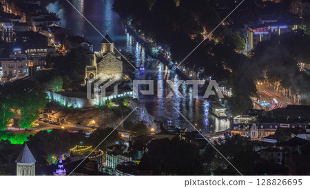 Metekhi Virgin Mary Assumption Church aerial night timelapse. Tbilisi, Georgia. Metekhi Virgin Mary Assumption Church aerial night timelapse. Tbilisi, Georgia. 128826695