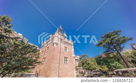 Renaissance dungeon clock tower and classical brick facade of the Capitole timelapse hyperlapse, city hall of Toulouse, France Renaissance dungeon clock tower and classical brick facade of the Capitole timelapse hyperlapse, city hall of Toulouse, France 128826712
