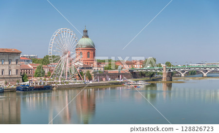 Aerial view of the Garonne River to La Grave Hospital's green dome timelapse hyperlapse. Toulouse, France 128826723