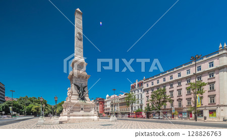 Restauradores Square in Lisbon timelapse hyperlapse. Monument to the Restorers and historical houses around Restauradores Square in Lisbon timelapse hyperlapse. Monument to the Restorers and historical houses around 128826763