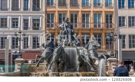 Hyperlapse of the Bartholdi Fountain, a symbol of Lyon, located on Place des Terreaux near City Hall. France 128826806