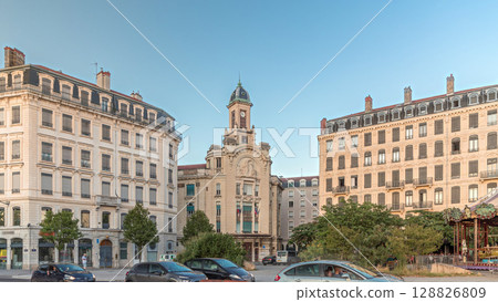 Hyperlapse of Place Antonin Jutard and the Mutuality Palace facade from the waterfront near Guillotiere Bridge in Lyon, France. Hyperlapse of Place Antonin Jutard and the Mutuality Palace facade from the waterfront near Guillotiere Bridge in Lyon, France. 128826809
