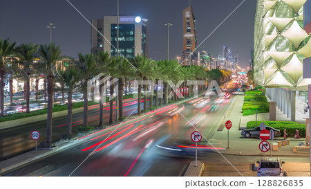 Aerial night timelapse of King Fahd Road near the illuminated Riyadh National Library in Riyadh, Saudi Arabia. Aerial night timelapse of King Fahd Road near the illuminated Riyadh National Library in Riyadh, Saudi Arabia. 128826835