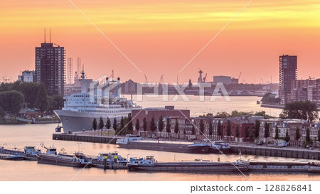 Aerial timelapse of Maashaven harbour during sunset in Rotterdam, The Netherlands 128826841