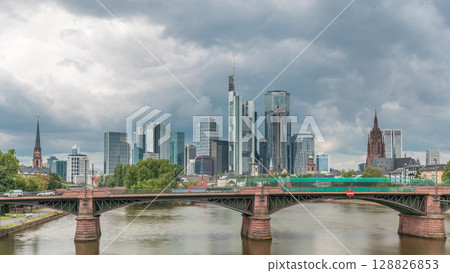 Aerial hyperlapse of Frankfurt skyline with Main River and Ignatz Bubis Bridge. Frankfurt, Germany 128826853