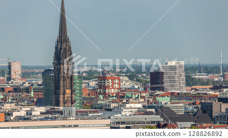 Aerial timelapse of Hamburg's historic city center skyline with iconic towers and spires. Germany Aerial timelapse of Hamburg's historic city center skyline with iconic towers and spires. Germany 128826892