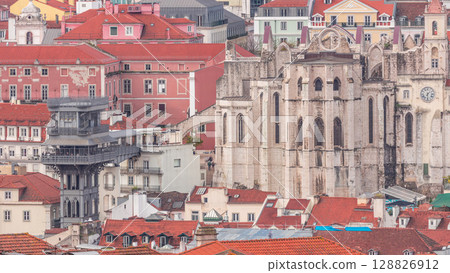 Lisbon from above timelapse: view of Barrio Alto district with Santa Justa Lift and Convento da Ordem do Carmo church. Portugal 128826912
