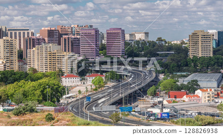 High perspective view of IP7 highway elevated road with curve turn near zoo aerial timelapse. Lisbon, Portugal High perspective view of IP7 highway elevated road with curve turn near zoo aerial timelapse. Lisbon, Portugal 128826938