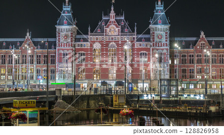 Illuminated Central Railway station night timelapse. Amsterdam, The Netherlands 128826958