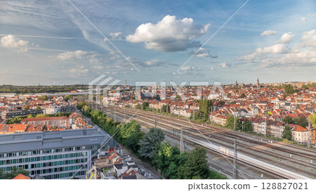 Aerial timelapse of Brussels North station railway tracks with trains arriving and departing. Belgium 128827021