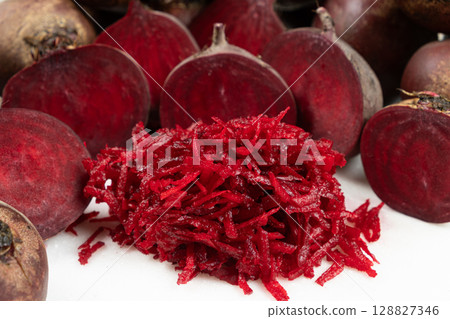 Fresh raw red beetroot grated, beet recipes Fresh raw red beetroot grated, beet recipes 128827346