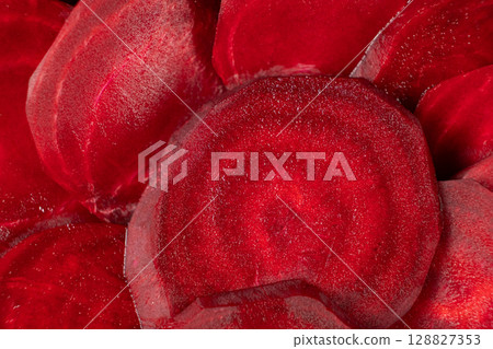Fresh Uncooked Beetroot Cut into Circular Slices Fresh Uncooked Beetroot Cut into Circular Slices 128827353