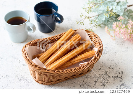 Churros in a basket Churros in a basket 128827469