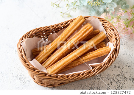 Churros in a basket 128827472