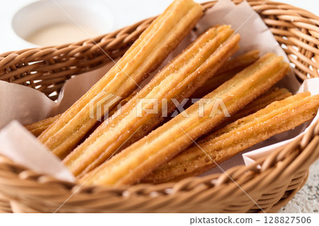 Churros in a basket 128827506