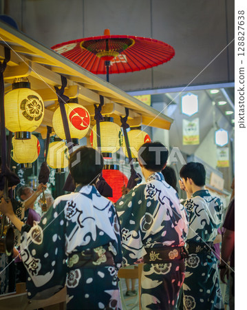 Kyoto Gion Festival Yoiyama Hiyori Kagura People of Ofuneboko entering Nishiki Market 128827638