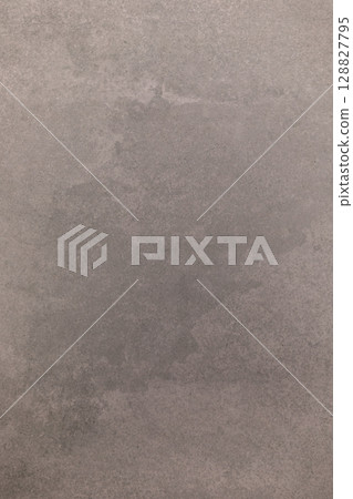 Wet spot on concrete surface exhibits irregular shape and texture in urban environment during late Wet spot on concrete surface exhibits irregular shape and texture in urban environment during late 128827795