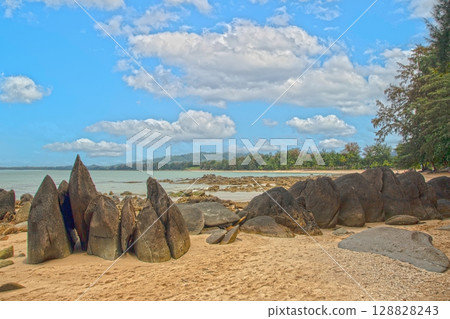 Rock formations on tropical beach in Khao Lak Thailand Rock formations on tropical beach in Khao Lak Thailand 128828243