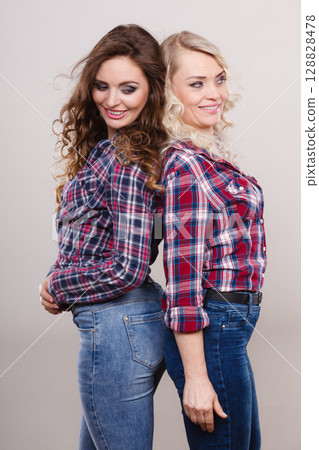 Portrait adult daughter with mother. 128828478