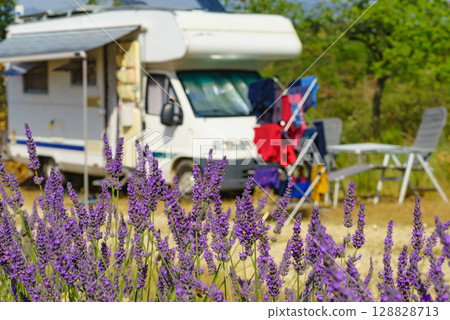 Clothes hanging to dry outdoors by camping car. Caravan vacation in France Clothes hanging to dry outdoors by camping car. Caravan vacation in France 128828713
