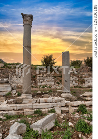 Ancient Roman Columns at Sunset in the Historic Ruins of Ephesus, Selcuk, Turkey 128830189