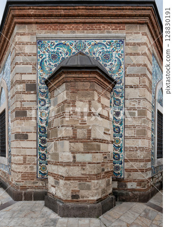 Konak Mosque, or Konak Camii. Architectural detail featuring mosque's mihrab with traditional Iznik tiles, Izmir, Turkey Konak Mosque, or Konak Camii. Architectural detail featuring mosque's mihrab with traditional Iznik tiles, Izmir, Turkey 128830191
