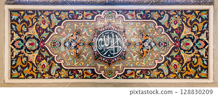 Intricate floral design and Arabic calligraphy at Juma mosque in Baku, Azerbaijan, Calligraphy translates to: God is the greatest 128830209