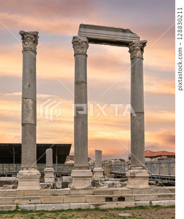 Ancient Roman Columns at Agora of Smyrna archaeological site, Izmir, Turkey, at sunset 128830211
