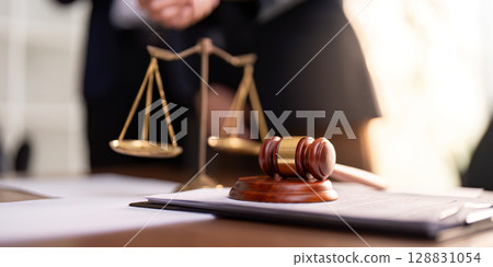 Legal Scales and Gavel on Office Desk 128831054