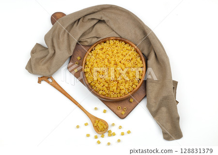 Italian pasta on a round dish isolated on a white background 128831379