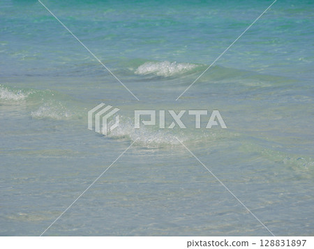 Waves close up background. The beach Spiaggia La Cinta in San Teodoro, Olbia, Sardinia 128831897