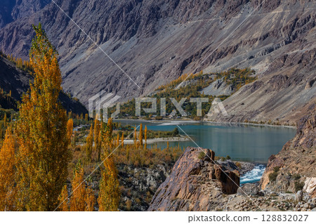 The autumn scenery with Hindu Kush mountain range in the background is very beautiful, Gahkuch,northern Pakistan. 128832027