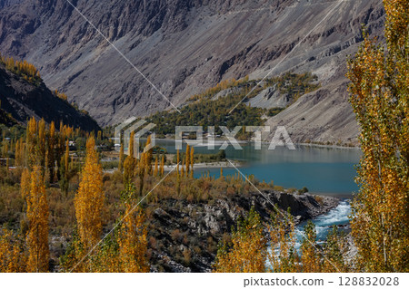 The autumn scenery with Hindu Kush mountain range in the background is very beautiful, Gahkuch,northern Pakistan. 128832028