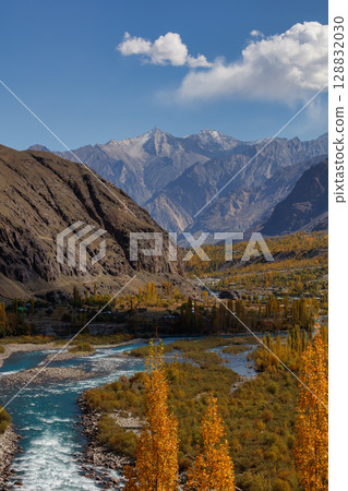 The autumn scenery with Hindu Kush mountain range in the background is very beautiful, Gahkuch,northern Pakistan. 128832030