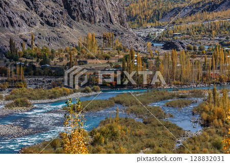 The autumn scenery with Hindu Kush mountain range in the background is very beautiful, Gahkuch,northern Pakistan. 128832031