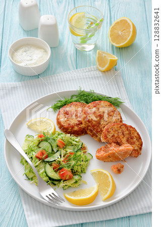 Hot Smoked salmon burgers, patties and coleslaw Hot Smoked salmon burgers, patties and coleslaw 128832641