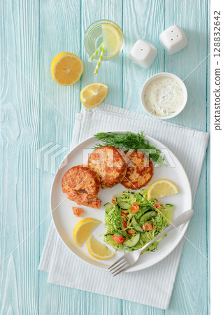 Hot Smoked salmon burgers, patties and coleslaw Hot Smoked salmon burgers, patties and coleslaw 128832642
