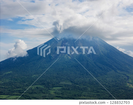 Big Concepcion volcano covered with clouds Big Concepcion volcano covered with clouds 128832703