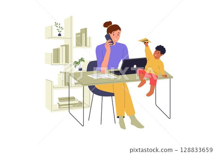 Freelancer Mom on Call While Child Plays Beside 128833659